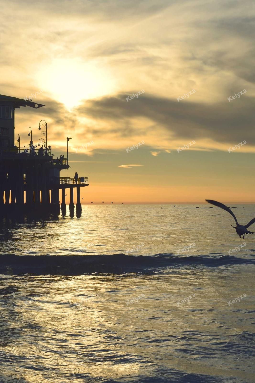 Pier Silhouette At Sunset