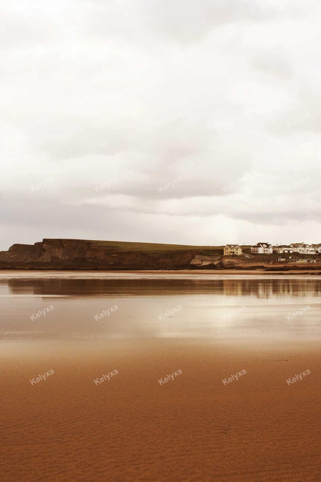 Coastal Village Beyond Tidal Flats