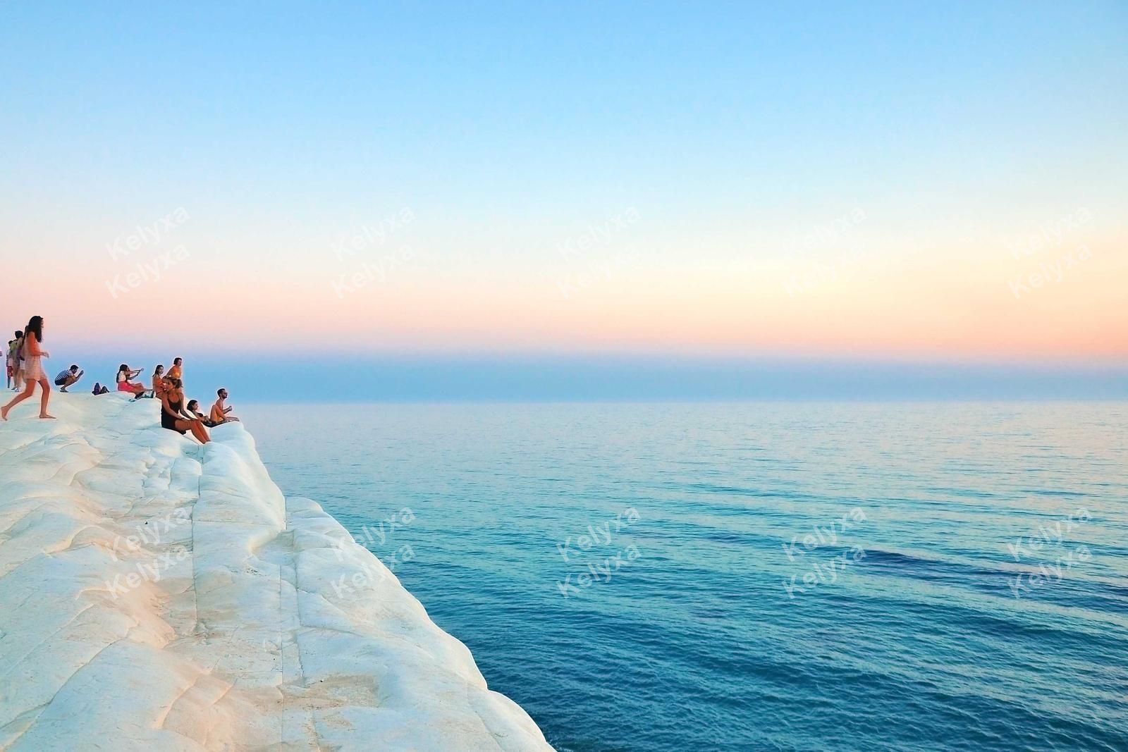 Sunset Watchers On White Cliff Edge