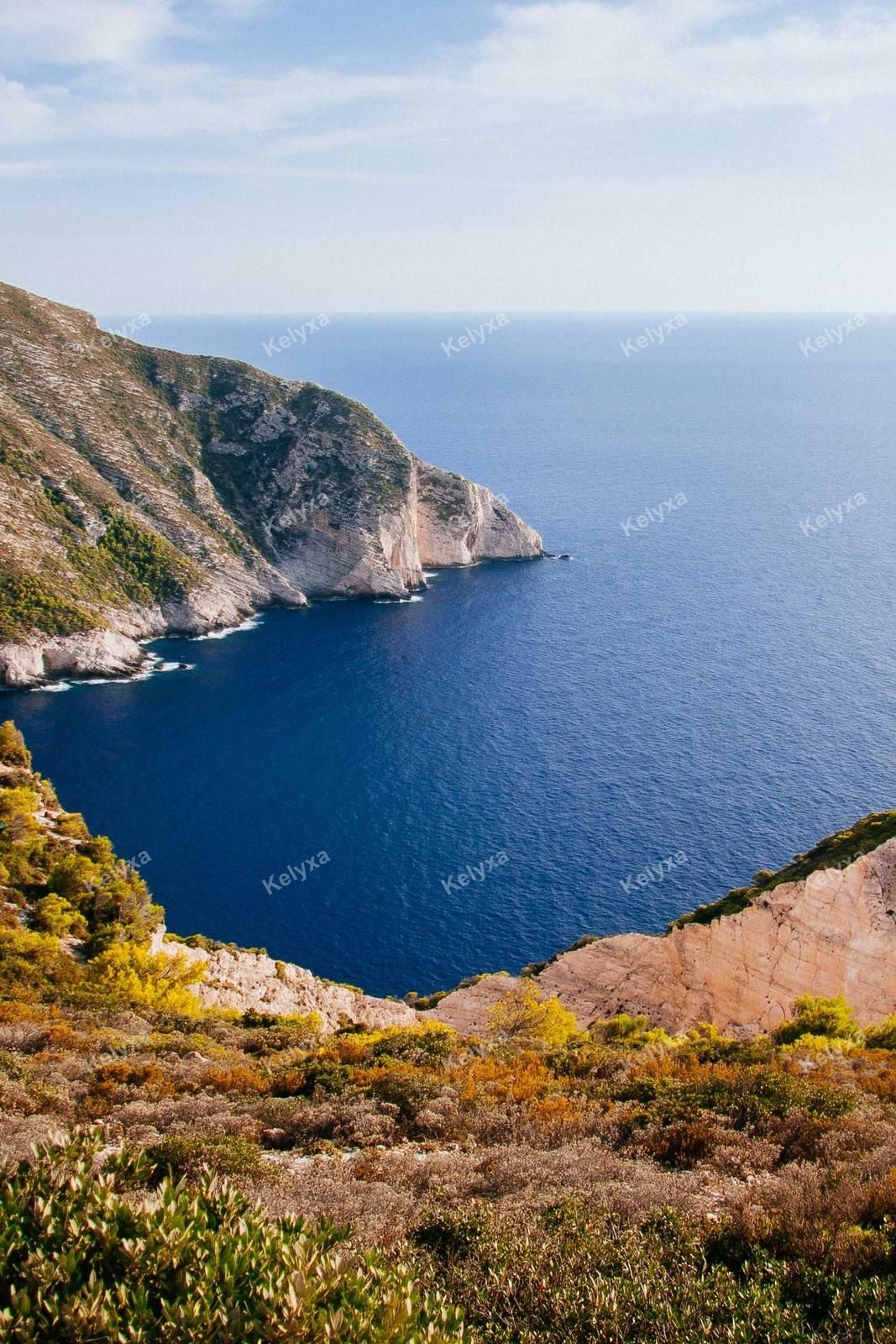 Coastal Cliffs Overlooking Deep Blue Bay
