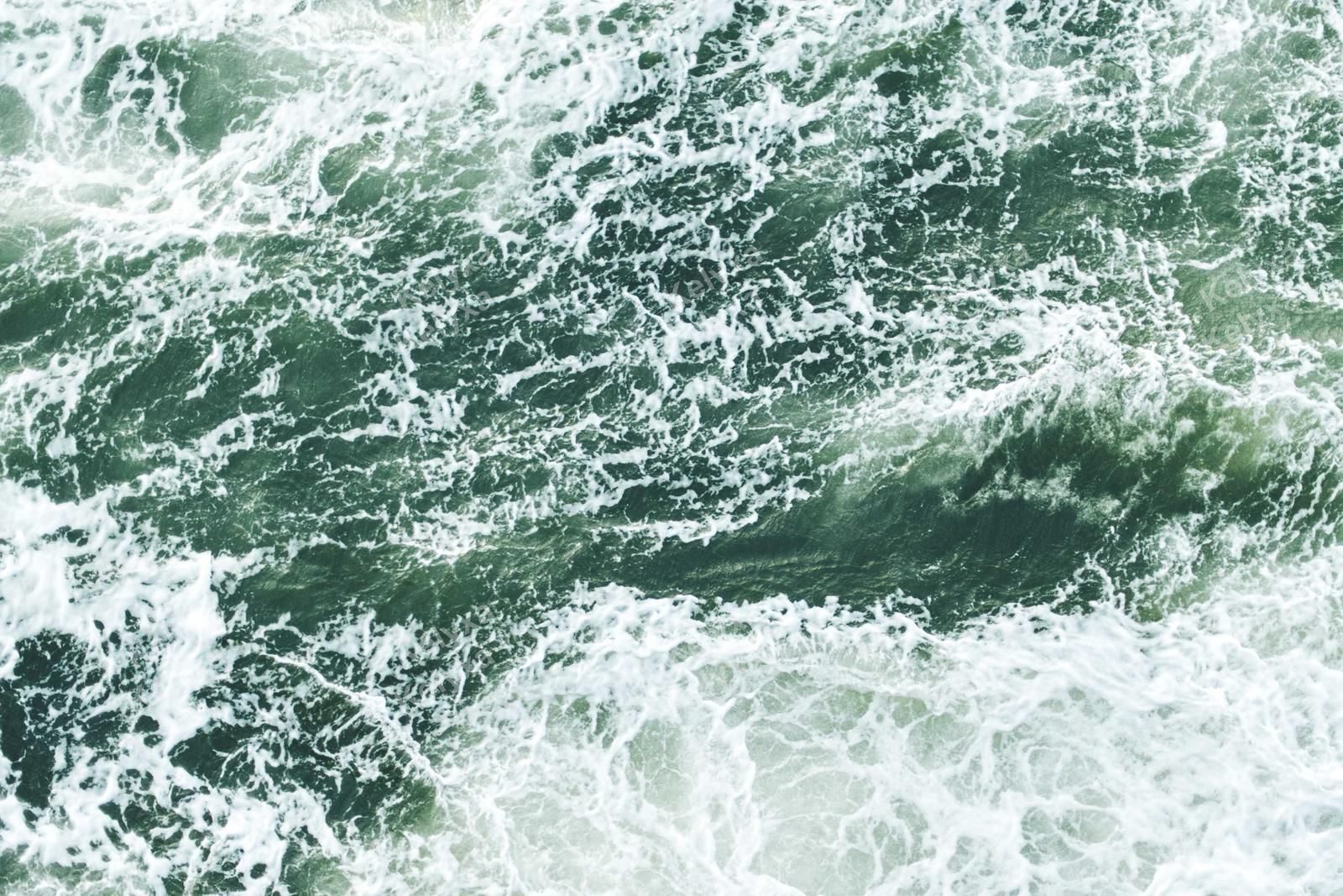 Aerial View Of Foaming Green Waves