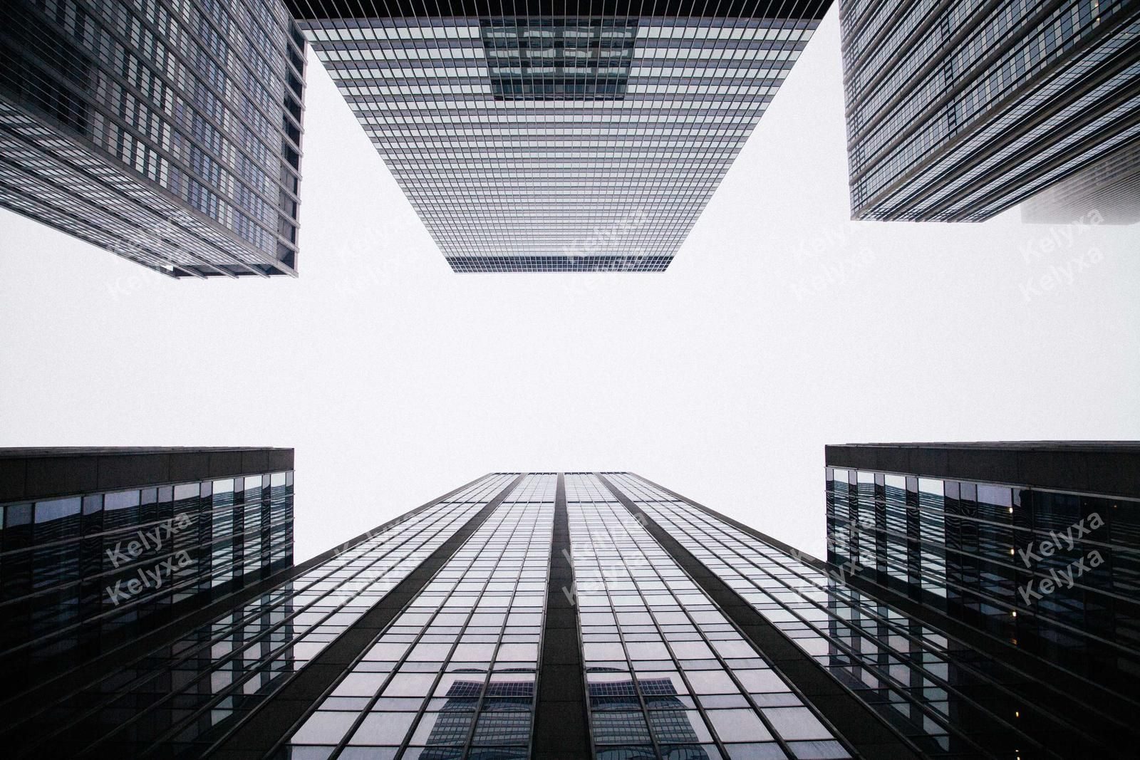 Looking Up At Glass Skyscrapers
