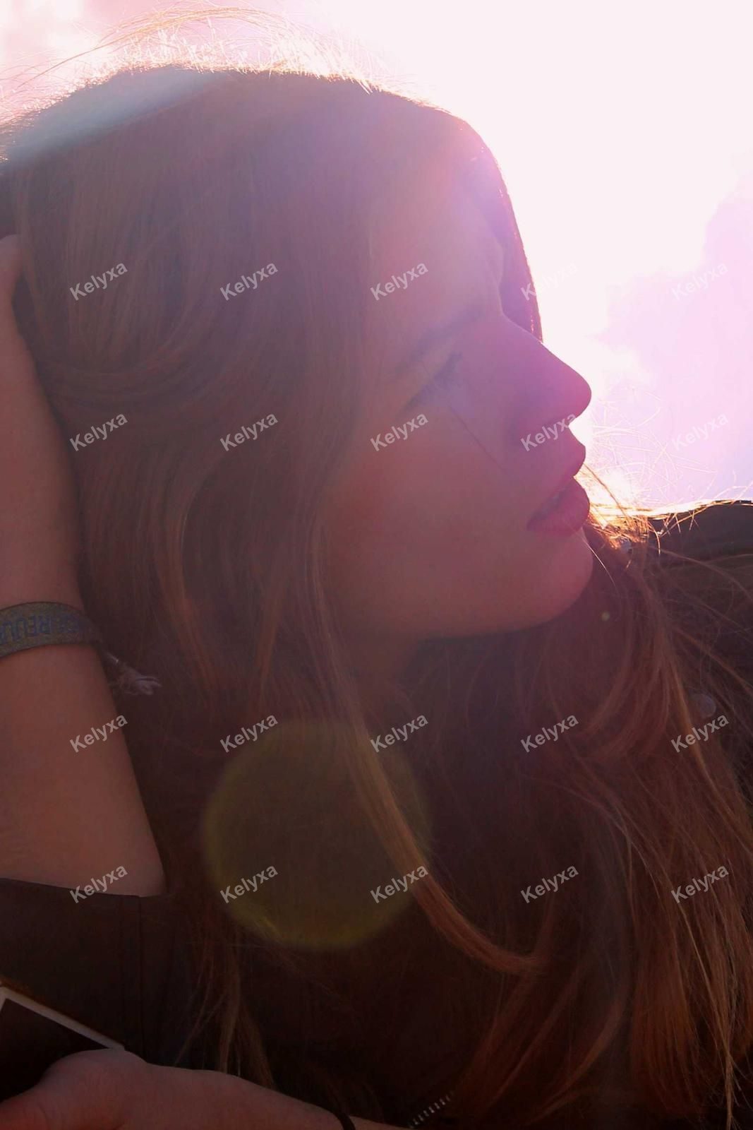 Sun Flare Portrait Of Woman