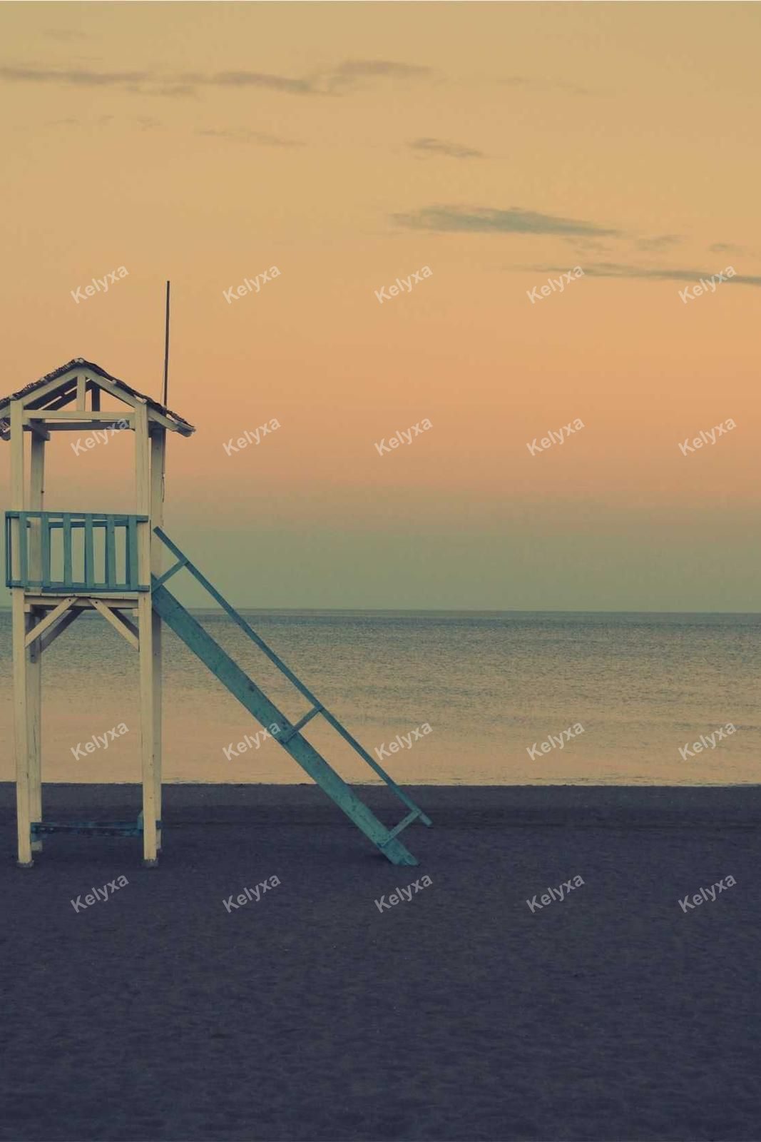 Weathered Beach Watchtower At Sunset